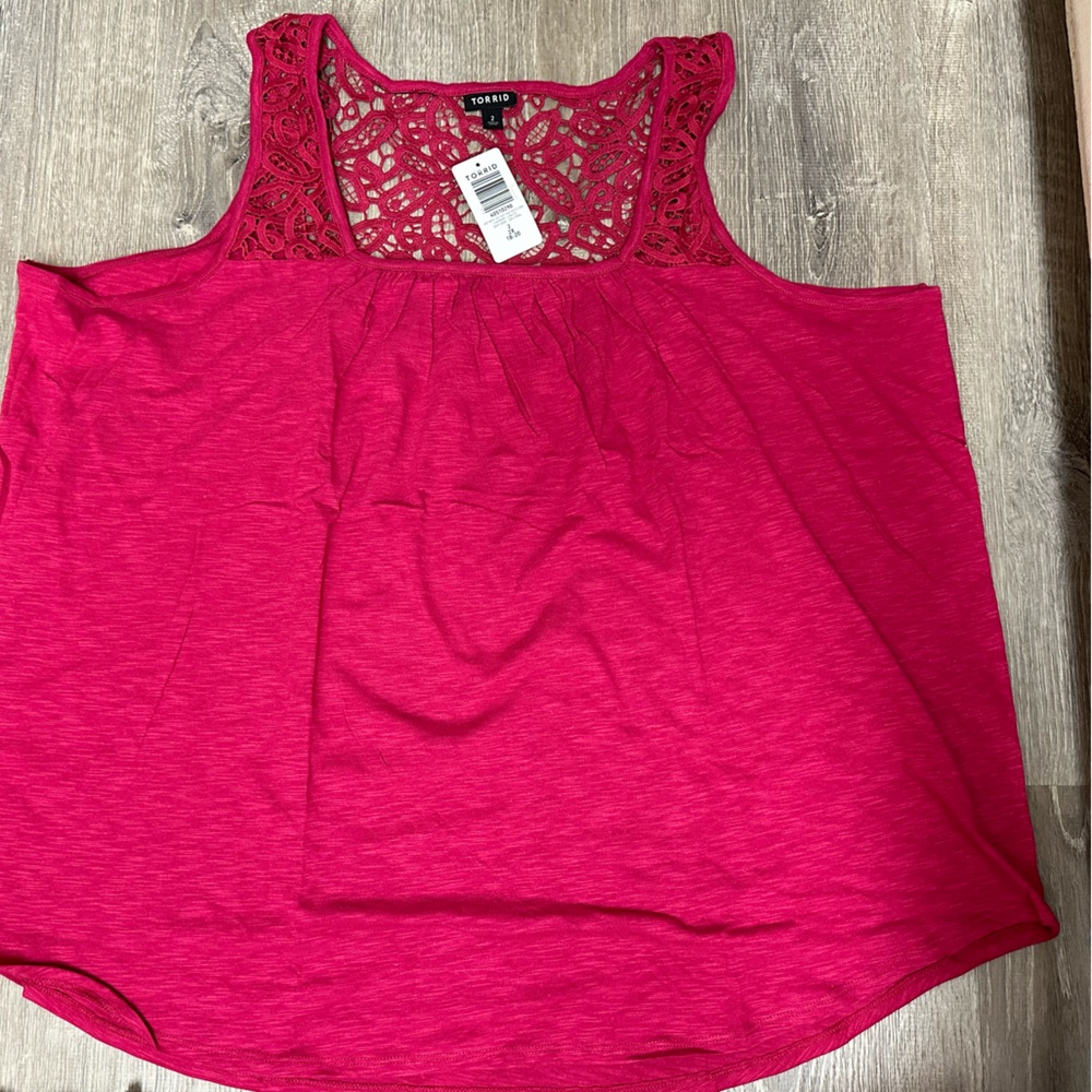 Pink women’s tank top with lace.